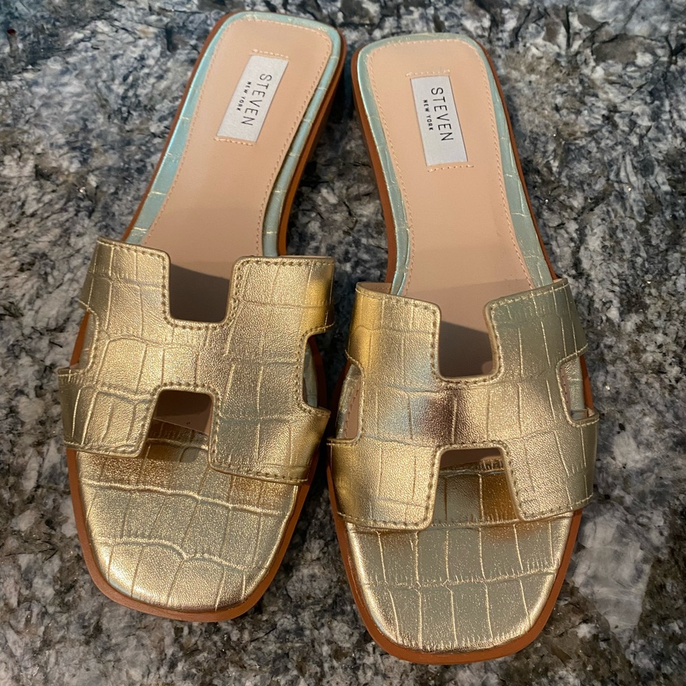 Gold sandals brand new in box